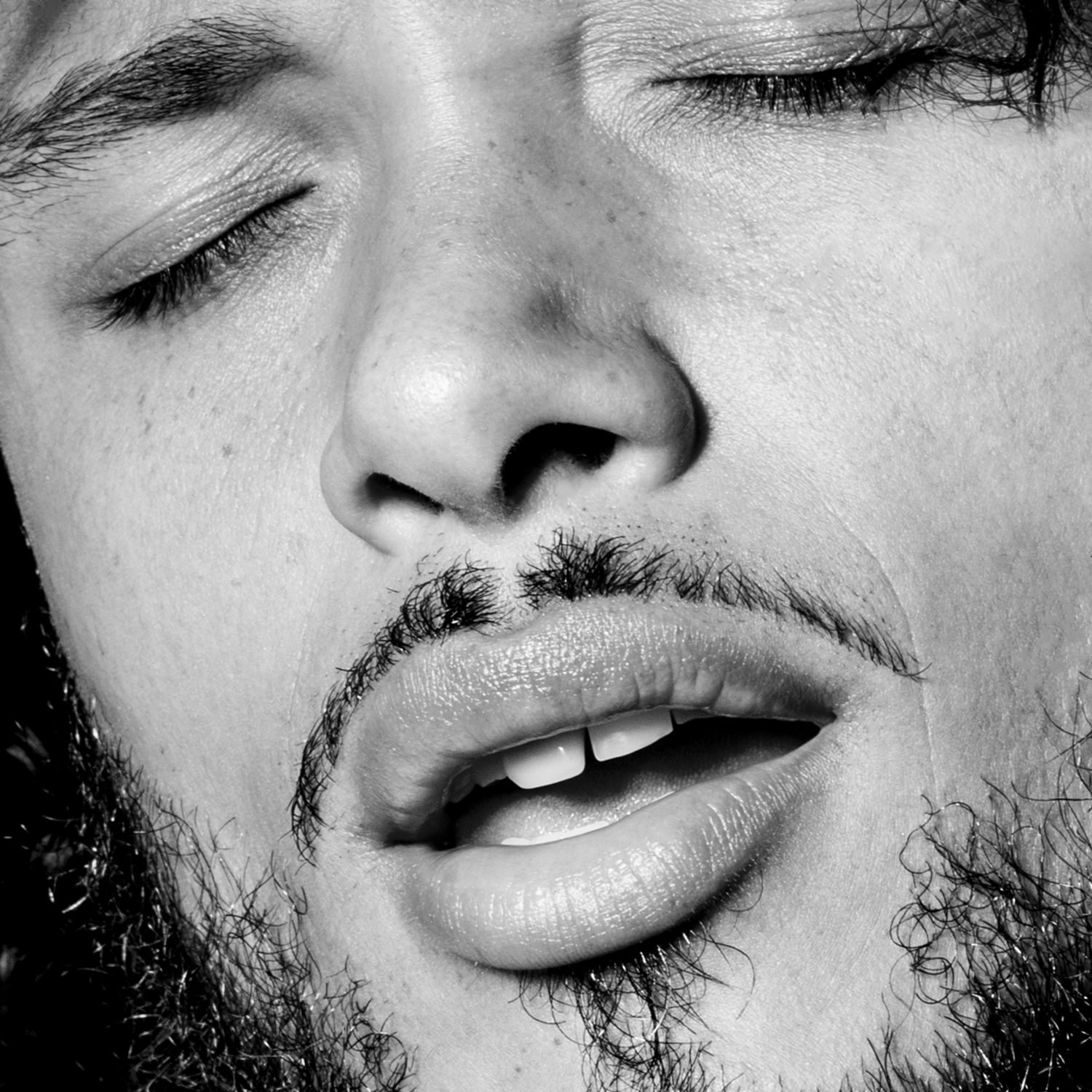 Anthony Flammia extreme close up singing in black and white by Aviva Klein